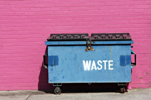 Depot staff preparing skips for eco-friendly waste disposal in Knightsbridge