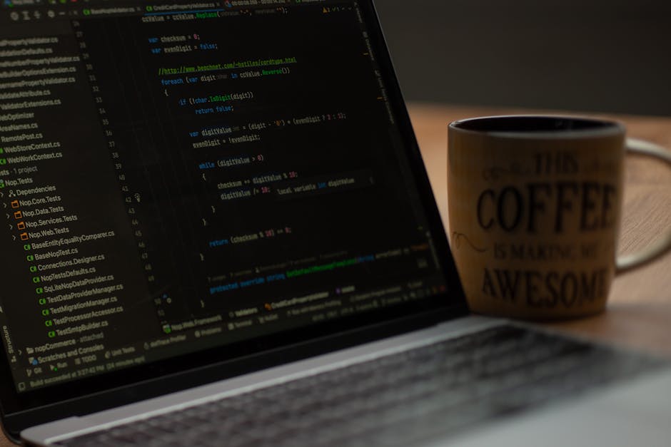 The image displays a close-up view of a computer screen showing lines of HTML code in a text editor. The code features various tags and attributes in multiple colors, including blue, yellow, red, and